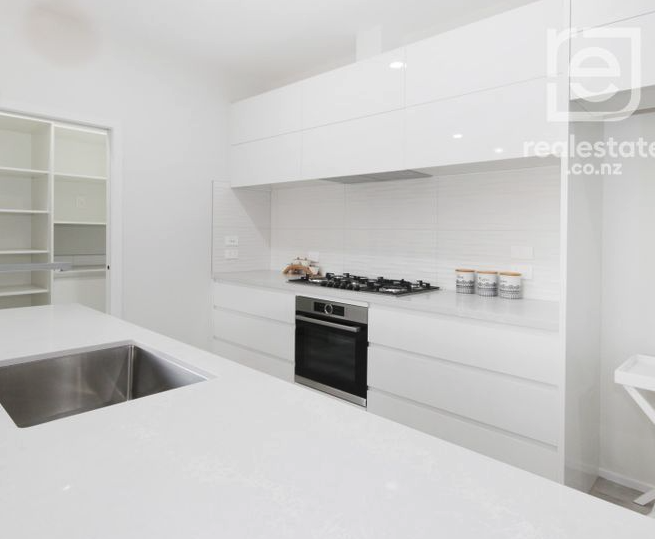 Kitchen island and walk-in pantry